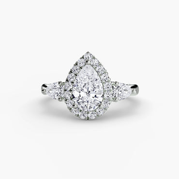 Diamond ring with a pear-shaped center stone on a white background