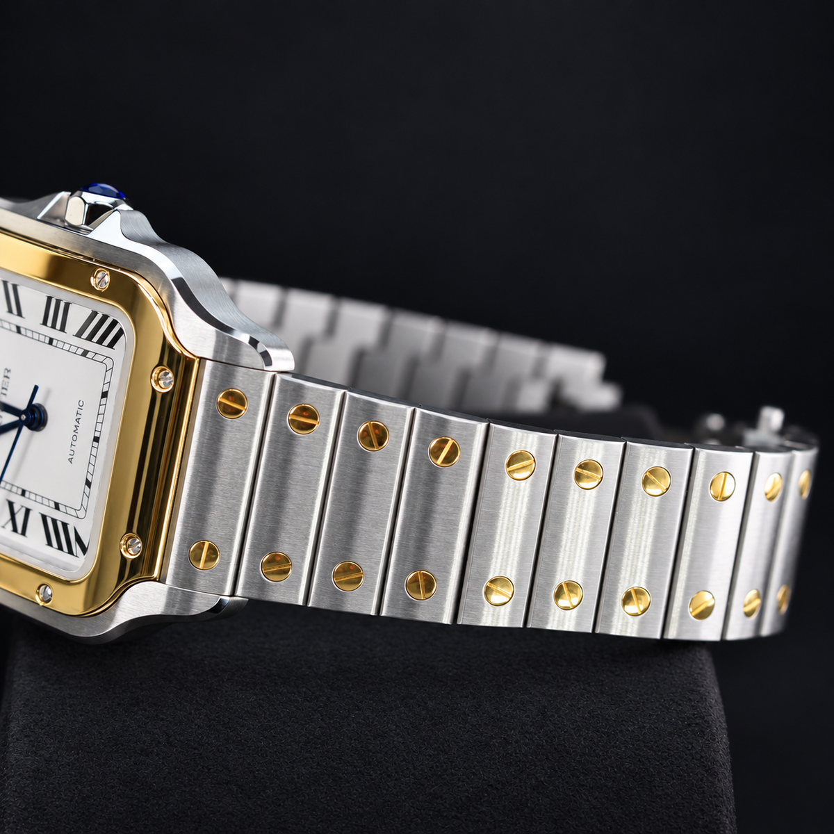 Cartier Santos W2SA0016 side view of steel bracelet and yellow gold bezel