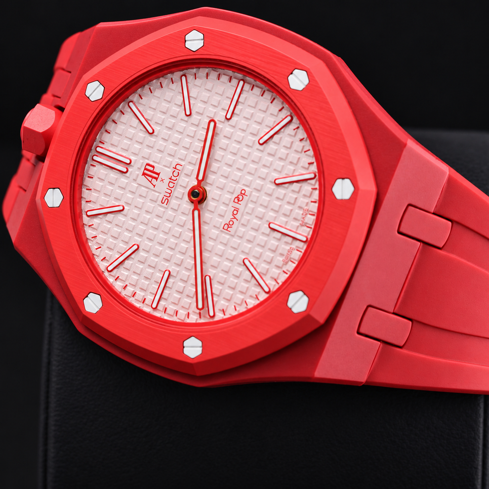 Royal Pop Otto Rosso SSX03R100N pink-red dial and textured face, close-up