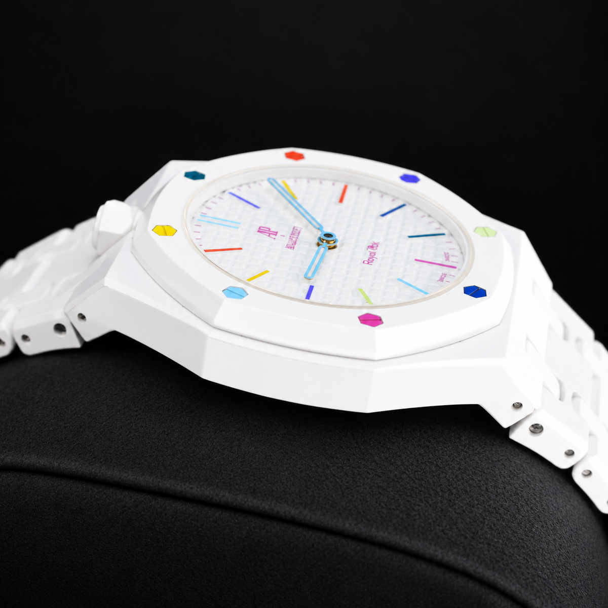 Royal Pop HUIT BLANC low side view showing white case and linked bracelet with crown on the left