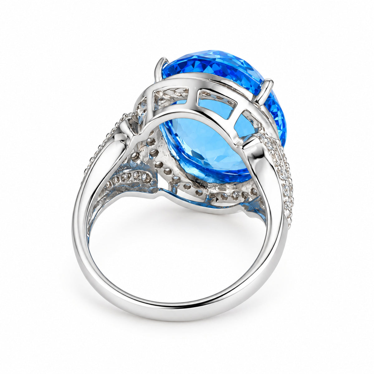 Rear view of 18ct white gold blue topaz ring showing its open-backed setting and band.