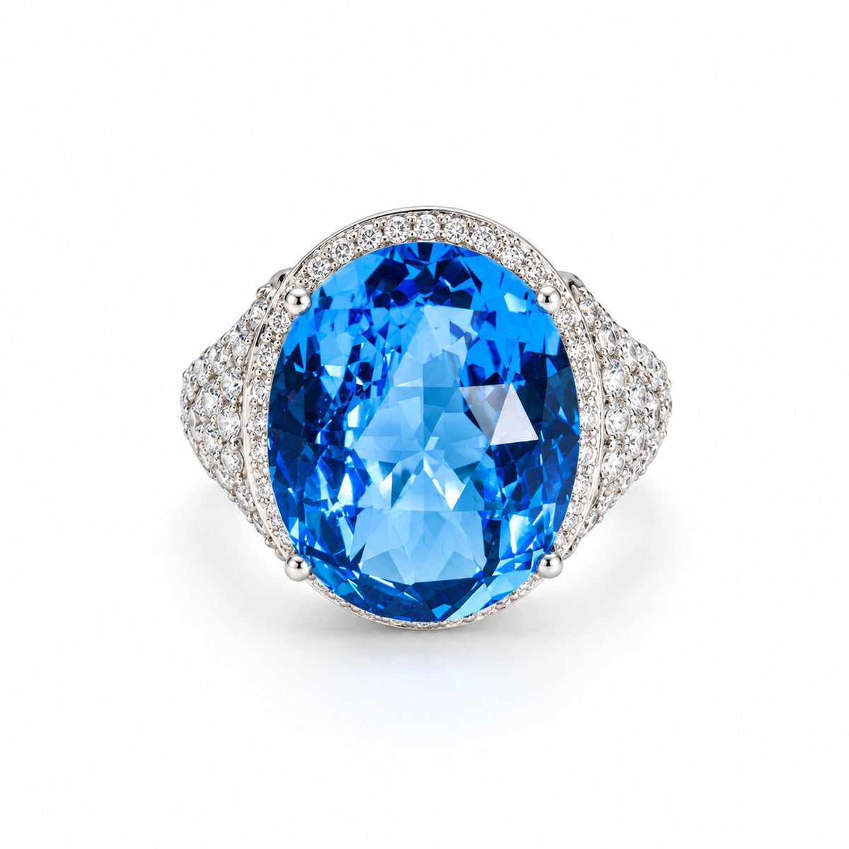 Oval blue topaz and natural diamond halo ring in 18ct white gold, front view.
