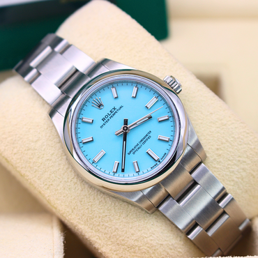 Rolex Oyster Perpetual 277200 Oyster Bracelet Blue Dial Stainless Steel 2023 Unworn Condition Smooth Bezel 31 Mm Mechanical Watch - product image from Im...