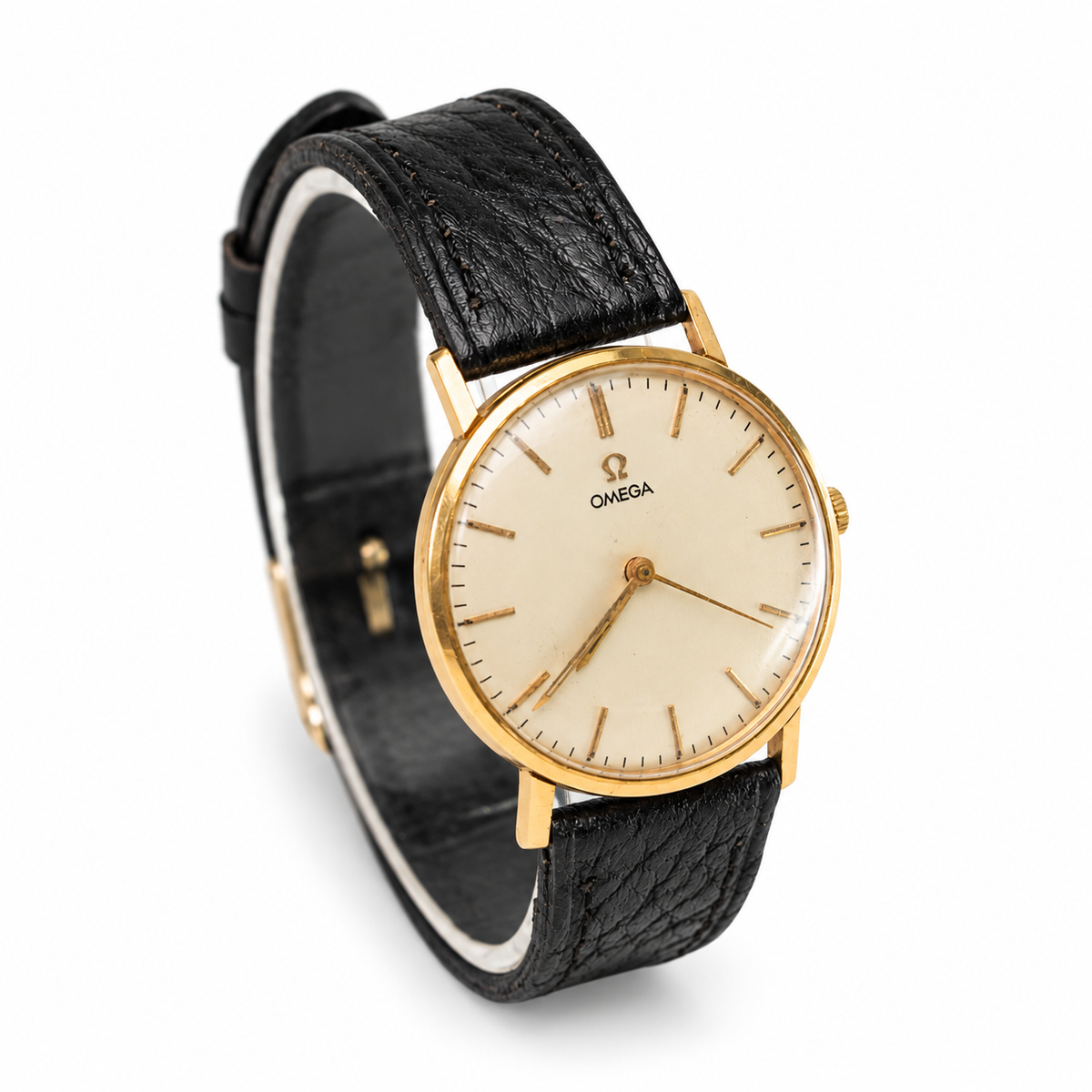 Omega vintage champagne dial dress watch with applied baton hour markers and black leather strap