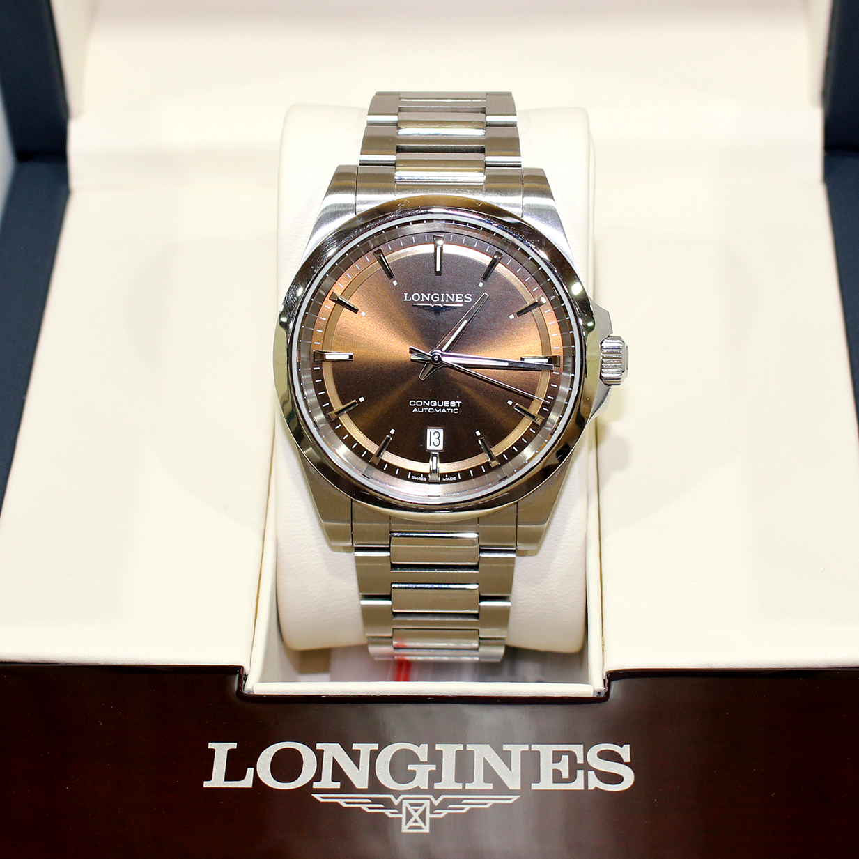 Longines watch in a box with the brand name visible