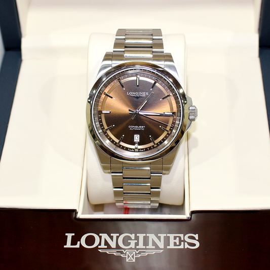 Longines watch in a box with the brand name visible