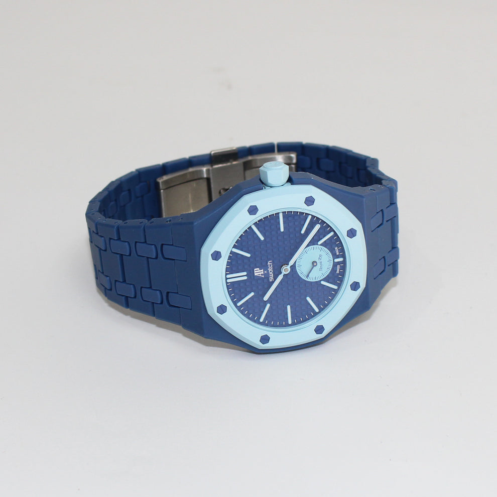 Swatch x Audemars Piguet Royal Pop LAN BA with navy-blue linked bracelet, blue dial and light-blue bezel at an angle