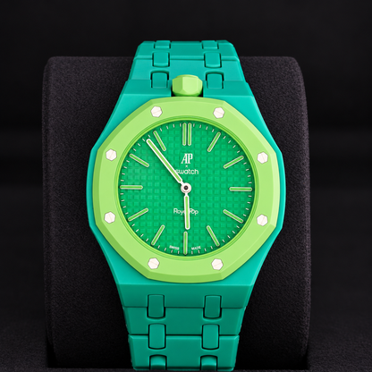 Swatch x Audemars Piguet Royal Pop GREEN EIGHT with green linked bracelet displayed upright on a black cushion