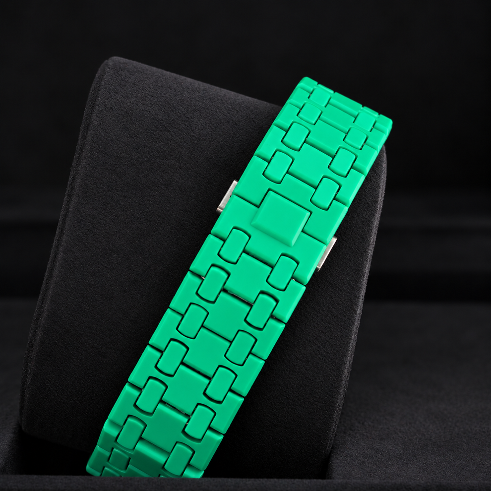 Royal Pop GREEN EIGHT green linked bracelet and closed clasp shown on a black display cushion
