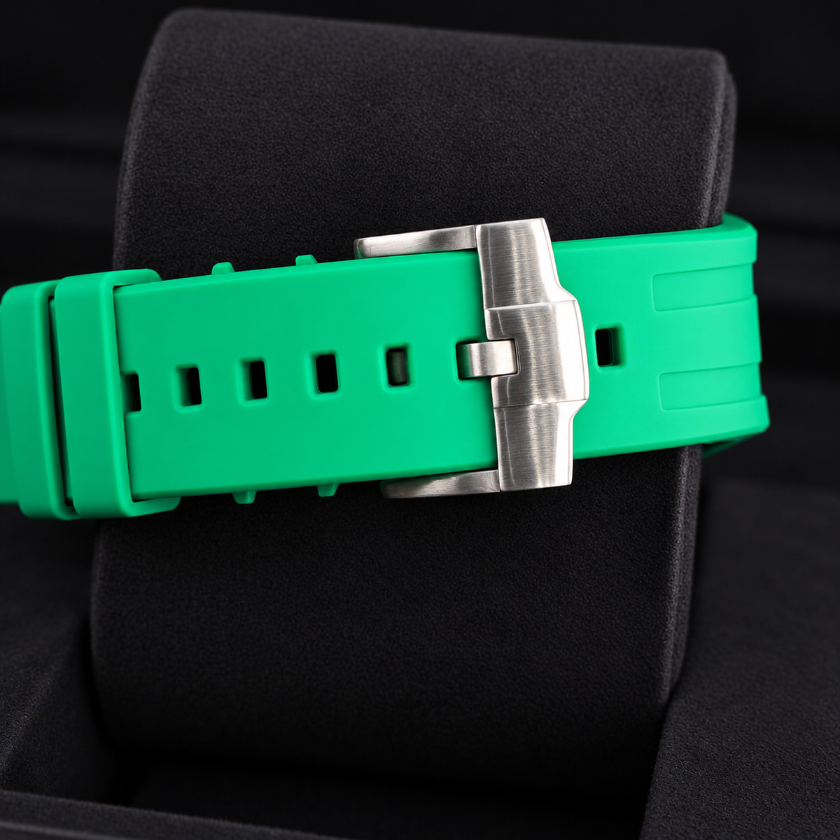 Royal Pop GREEN EIGHT green strap with silver-tone buckle and adjustment holes on a black cushion
