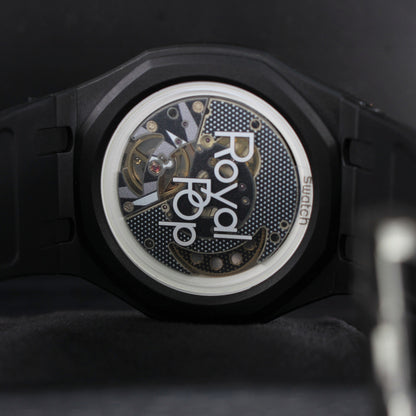 Royal Pop OCHO NEGRO transparent caseback close-up showing the movement and Royal Pop lettering