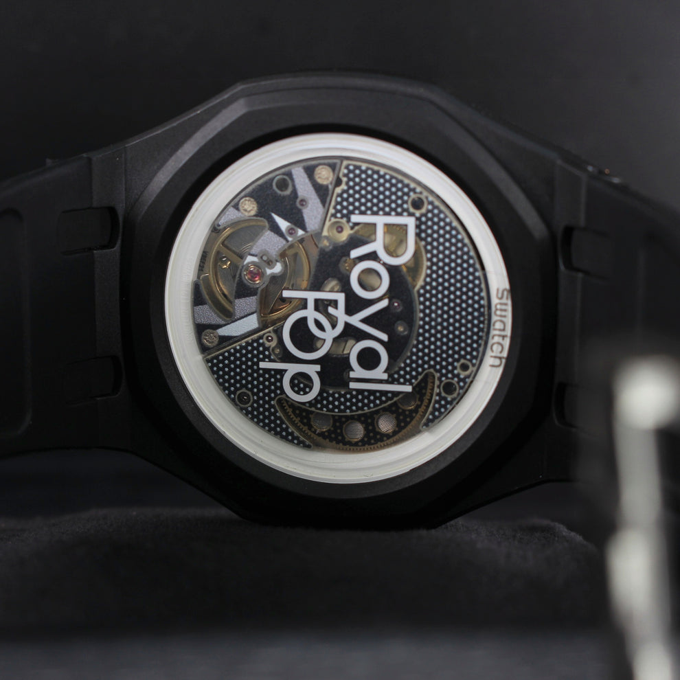 Royal Pop OCHO NEGRO transparent caseback close-up showing the movement and Royal Pop lettering