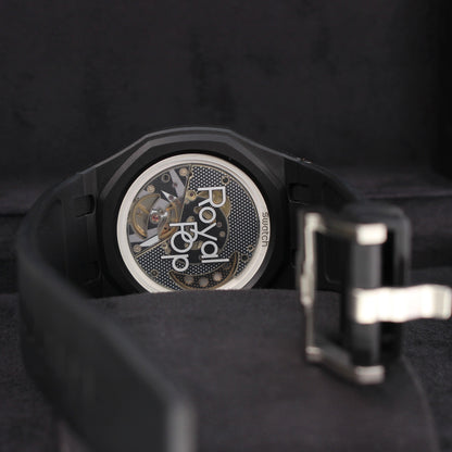 Royal Pop OCHO NEGRO rear view showing transparent caseback, black strap and open silver-tone buckle