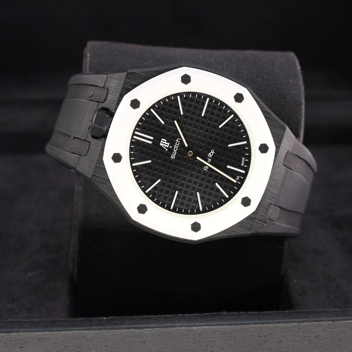 Royal Pop OCHO NEGRO opposite angled view showing black dial, white bezel and black strap with crown on the left