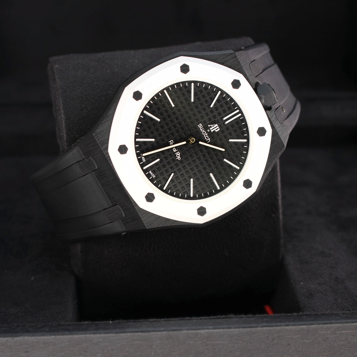 Royal Pop OCHO NEGRO angled dial view showing black strap and crown on the right with white octagonal bezel