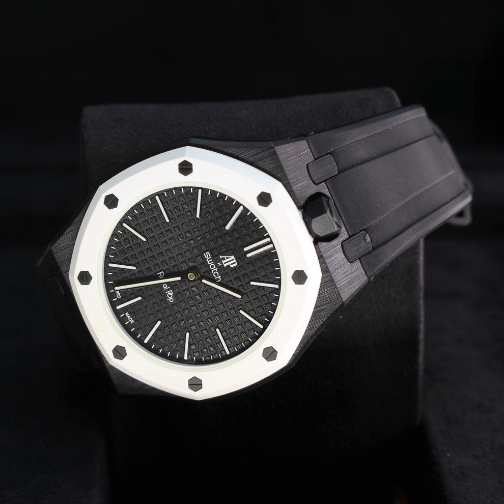Royal Pop OCHO NEGRO diagonal close-up showing textured black dial, white hour markers, white bezel and black strap