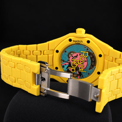 Yellow Royal Pop OTG ROZ SSX03J100N watch with turquoise-blue dial and pink subdial