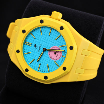 Swatch x AP Royal Pop OTG ROZ watch in yellow rubber bracelet wrist configuration