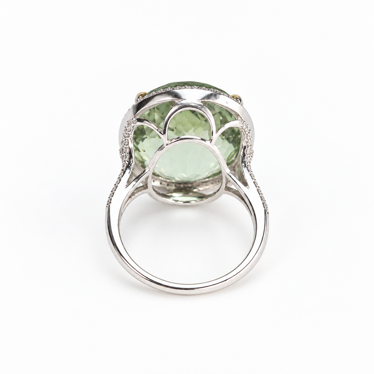 Underside of green amethyst ring showing open gallery and 18ct white gold band with diamond accents