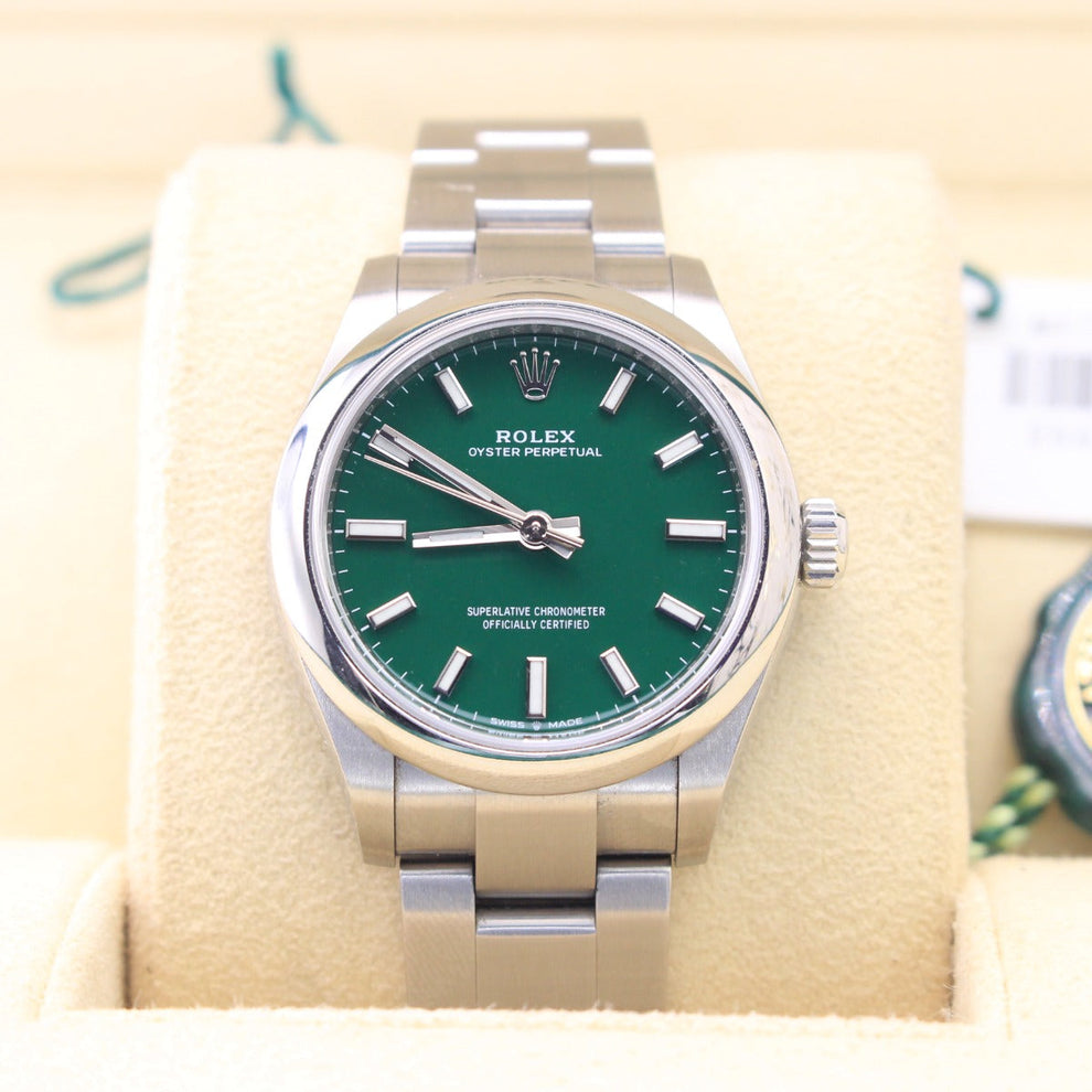 Rolex Oyster Perpetual 277200 Oyster Bracelet Green Dial Stainless Steel 2021 Unworn Condition Smooth Bezel 31 Mm Mechanical Watch - product image from I...