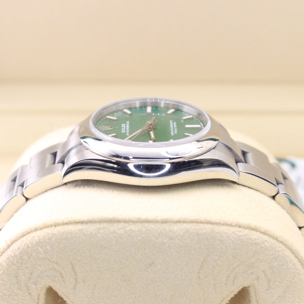 Rolex Oyster Perpetual 277200 Oyster Bracelet Green Dial Stainless Steel 2021 Unworn Condition Smooth Bezel 31 Mm Mechanical Watch - product image from I...