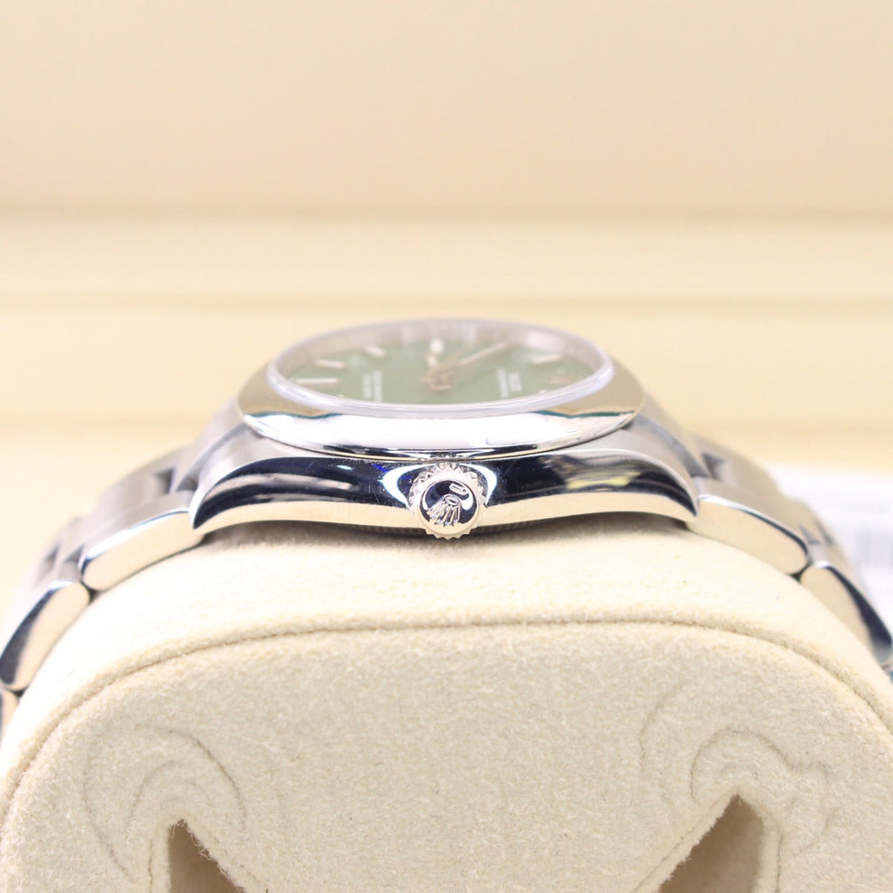 Rolex Oyster Perpetual 277200 Oyster Bracelet Green Dial Stainless Steel 2021 Unworn Condition Smooth Bezel 31 Mm Mechanical Watch - product image from I...