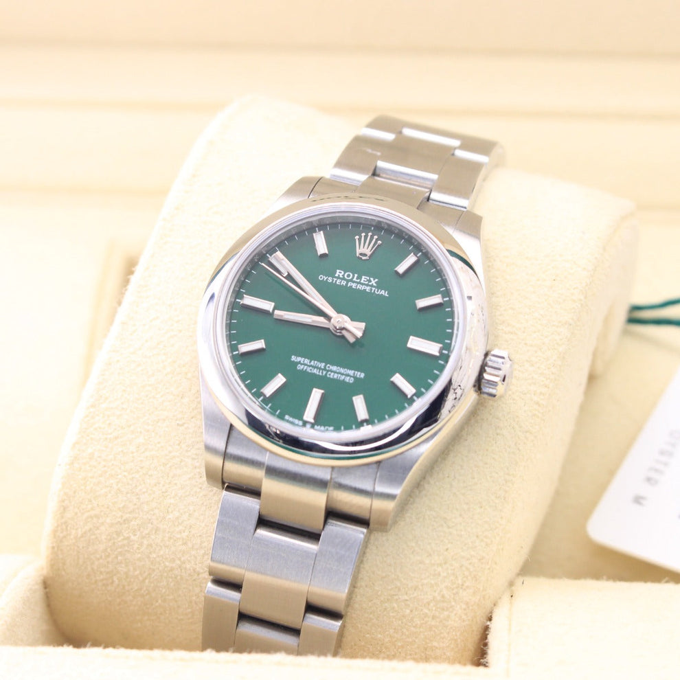 Rolex Oyster Perpetual 277200 Oyster Bracelet Green Dial Stainless Steel 2021 Unworn Condition Smooth Bezel 31 Mm Mechanical Watch - product image from I...