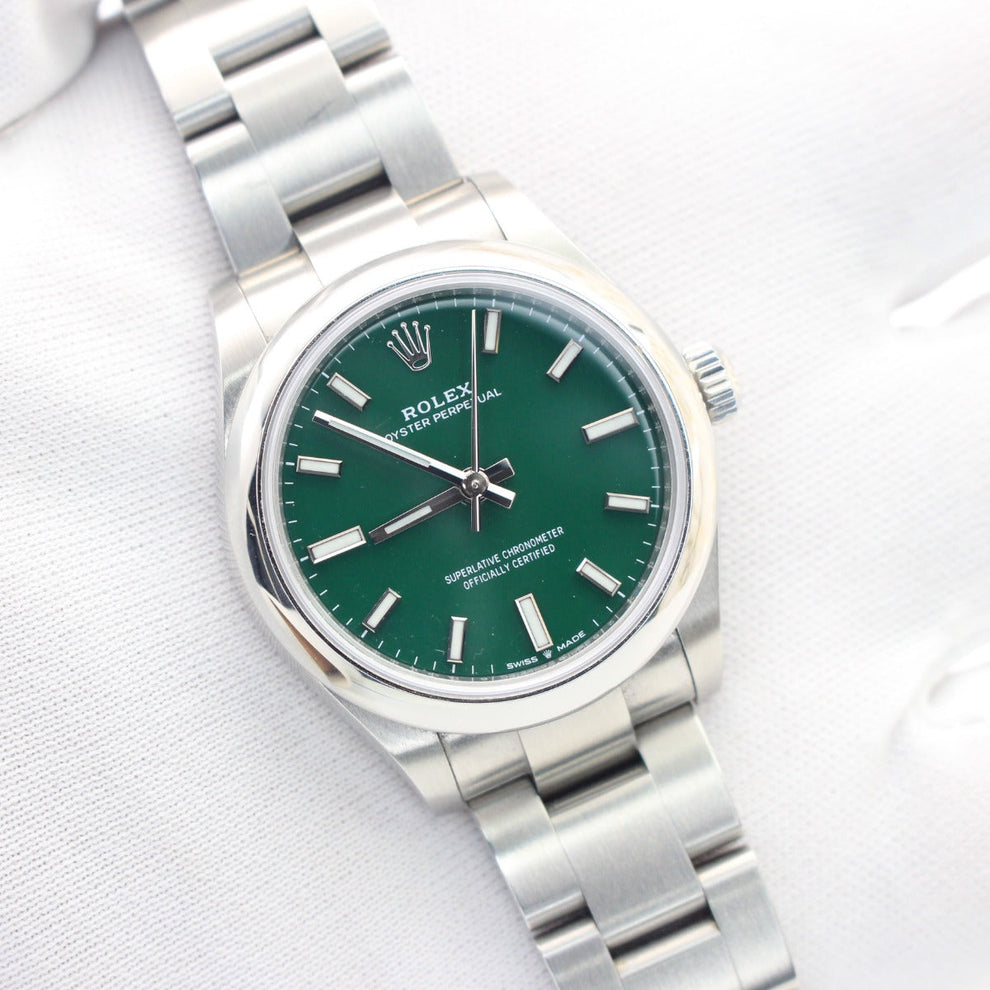 Rolex Oyster Perpetual 277200 Oyster Bracelet Green Dial Stainless Steel 2021 Unworn Condition Smooth Bezel 31 Mm Mechanical Watch - product image from I...