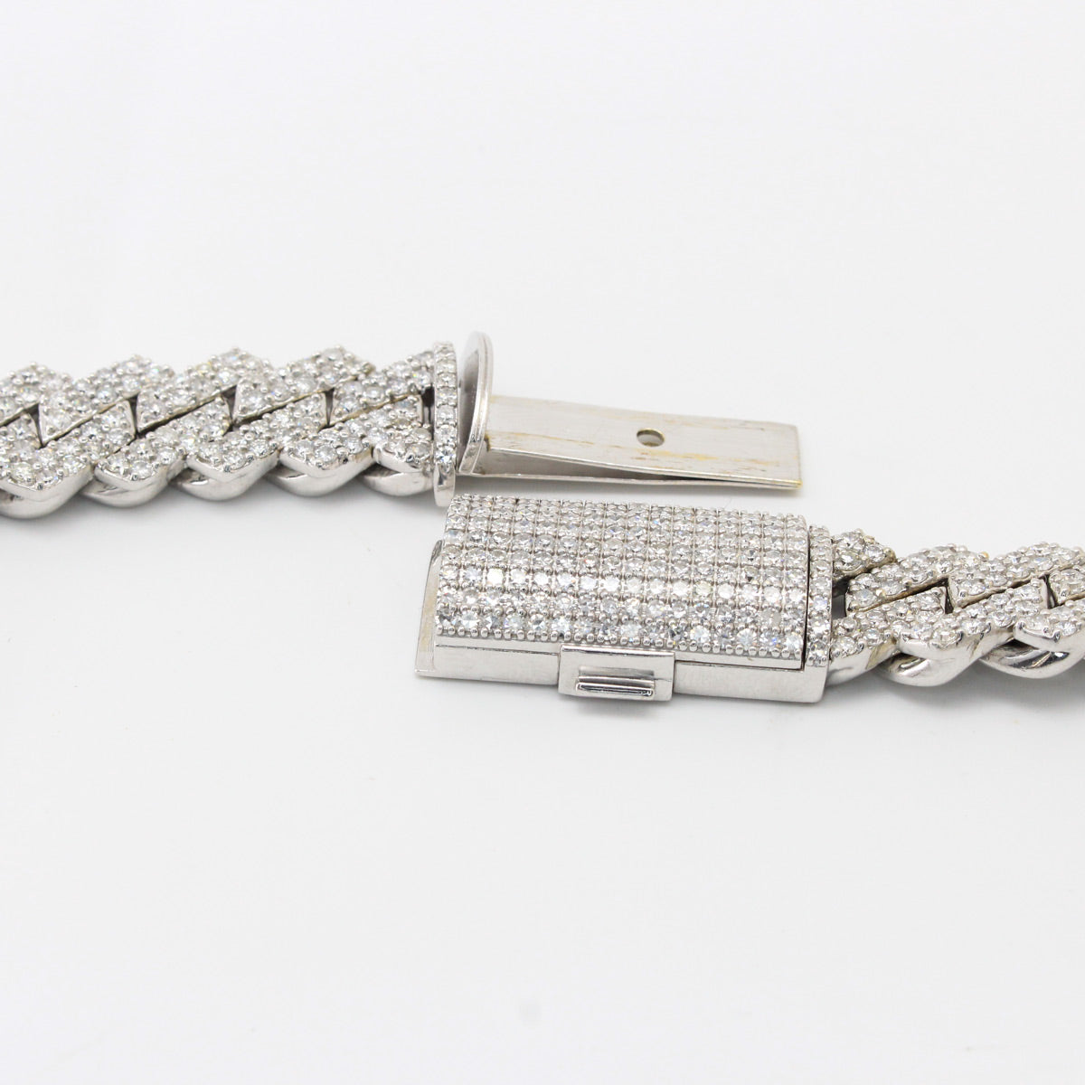 white gold bracelet with diamond accents on a white background