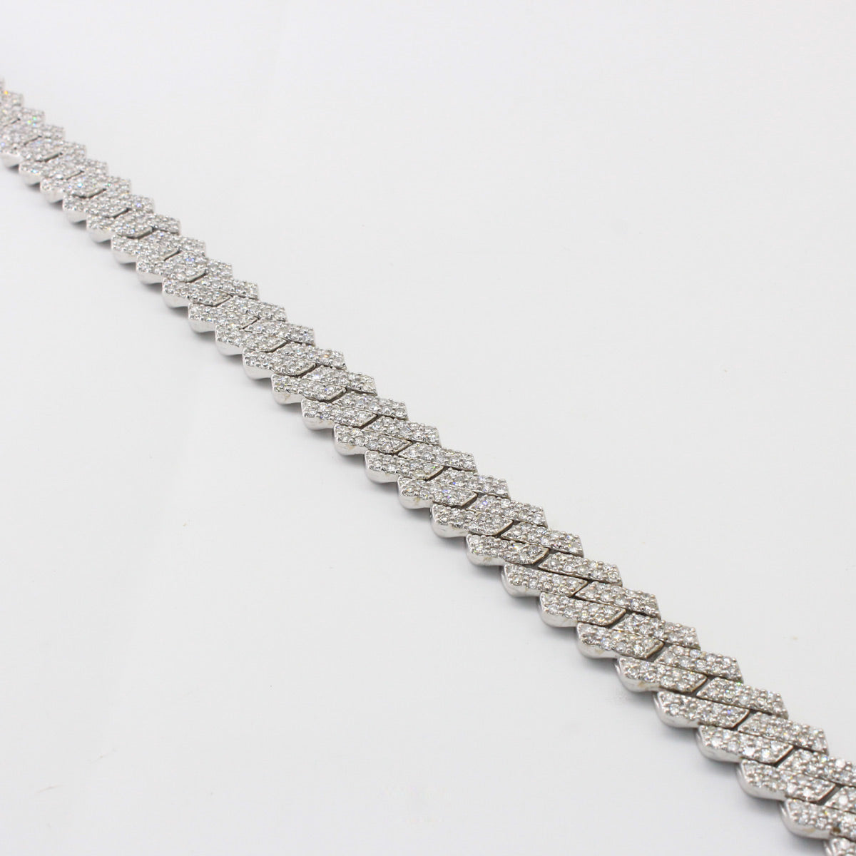 Diamond bracelet on a light gray background