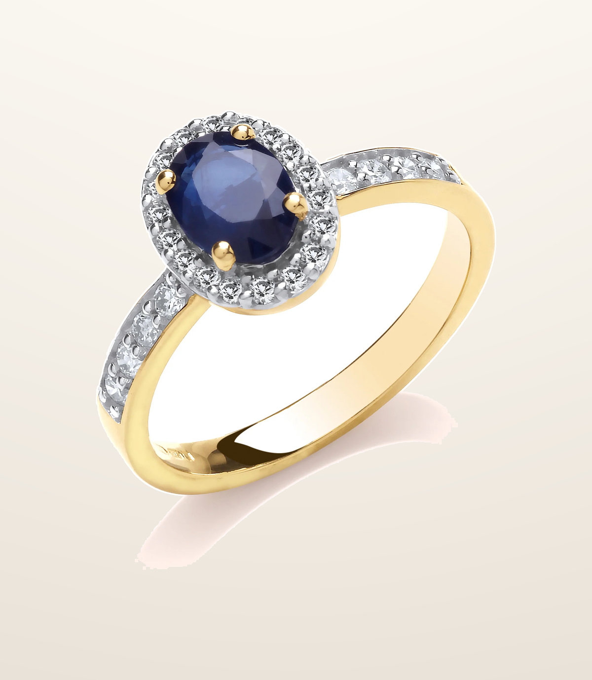 IT_ROLE:presentation_crop | 9ct 0.30ct Diamond & Oval Sapphire yellow Gold Ring