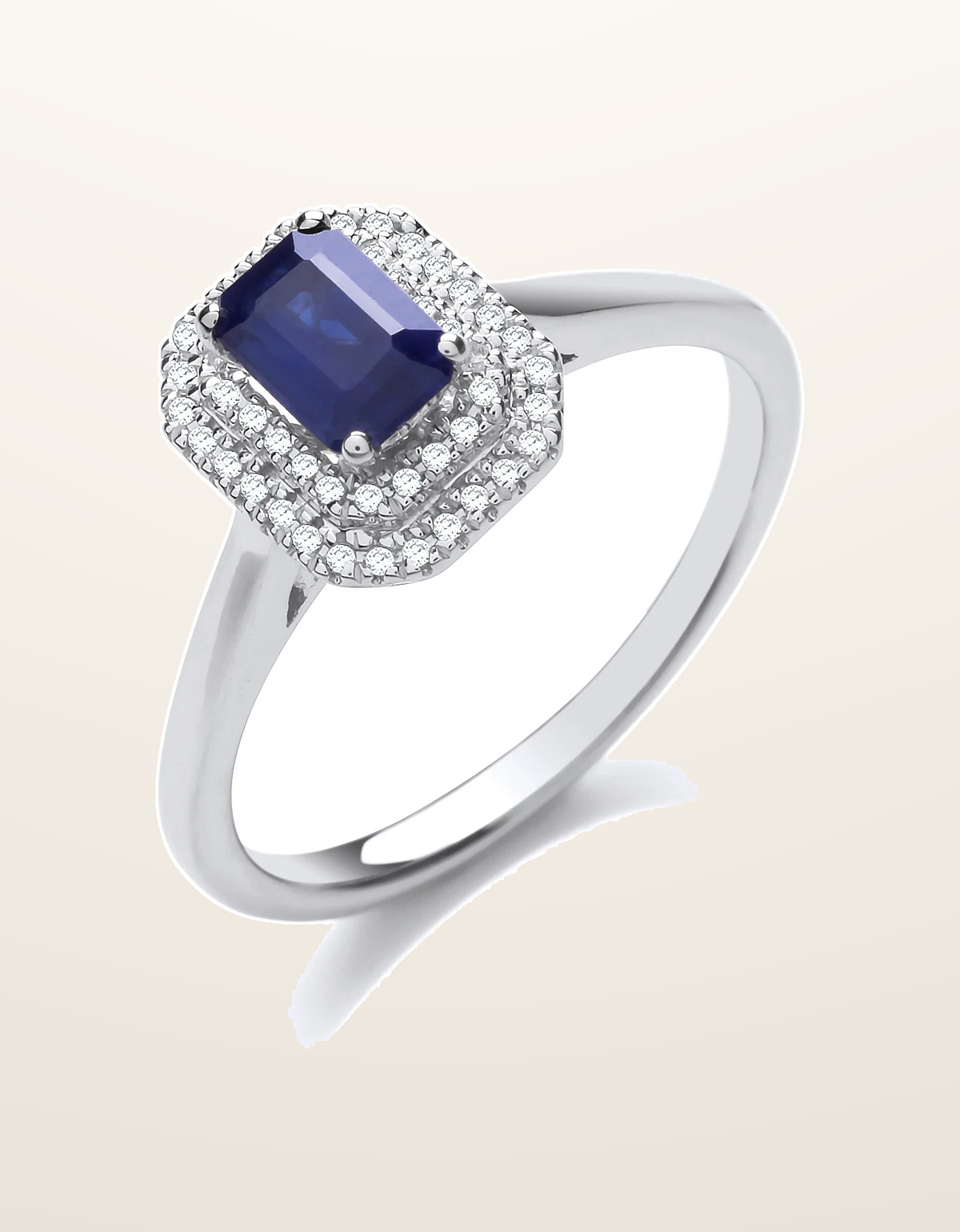 IT_ROLE:presentation_crop | 9ct White Gold Double 0.10ctw Diamond Halo Ring with 0.70ct Emerald Cut Sapphire