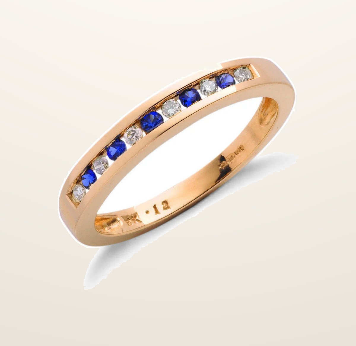 IT_ROLE:presentation_crop | 9ct Yellow Gold 0.12ct Diamond & 0.16ct Blue Sapphire Eternity Ring