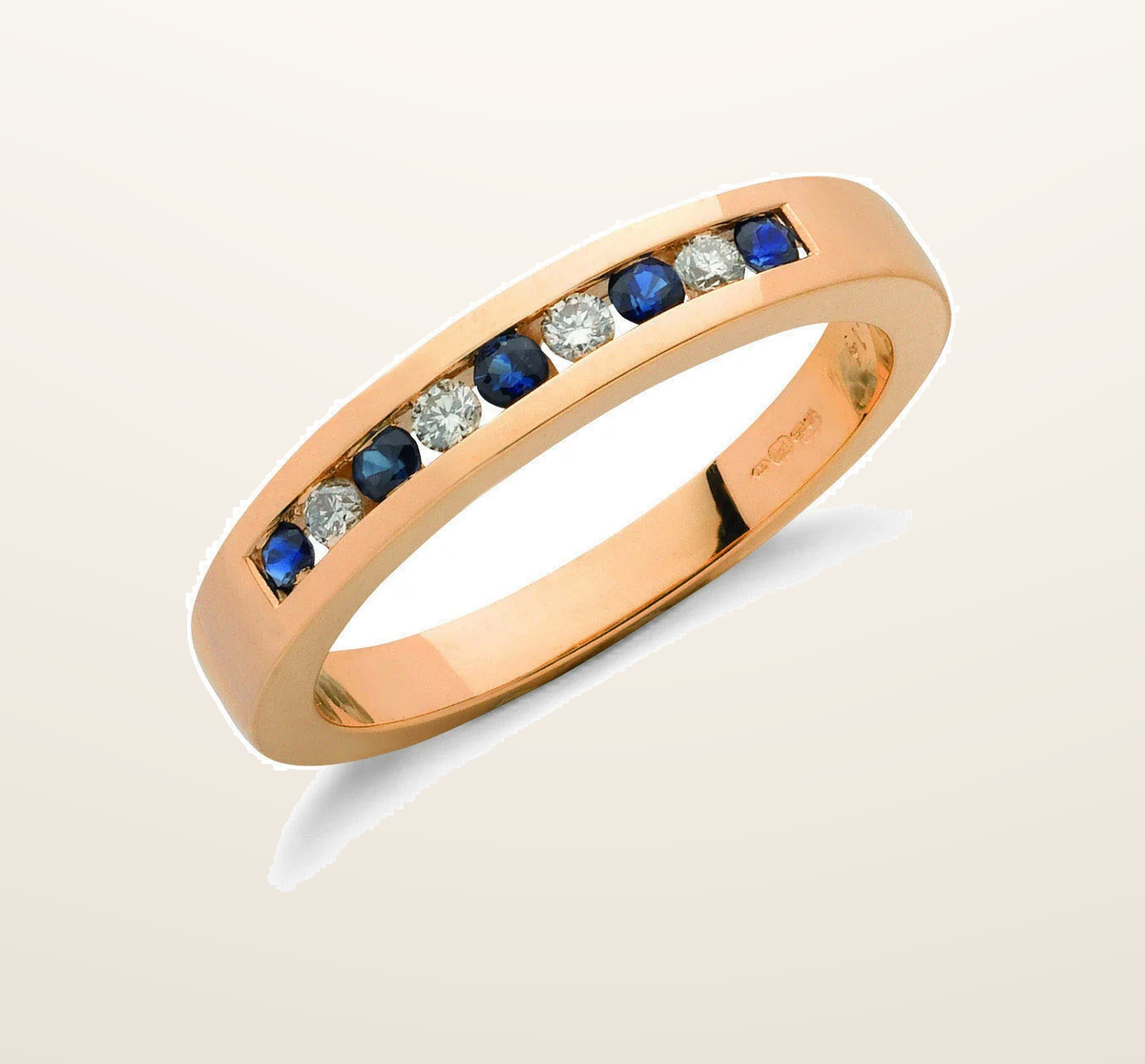 IT_ROLE:presentation_crop | 9ct Yellow Gold 0.14ct Diamond & 0.31ct Blue Sapphire Eternity Ring