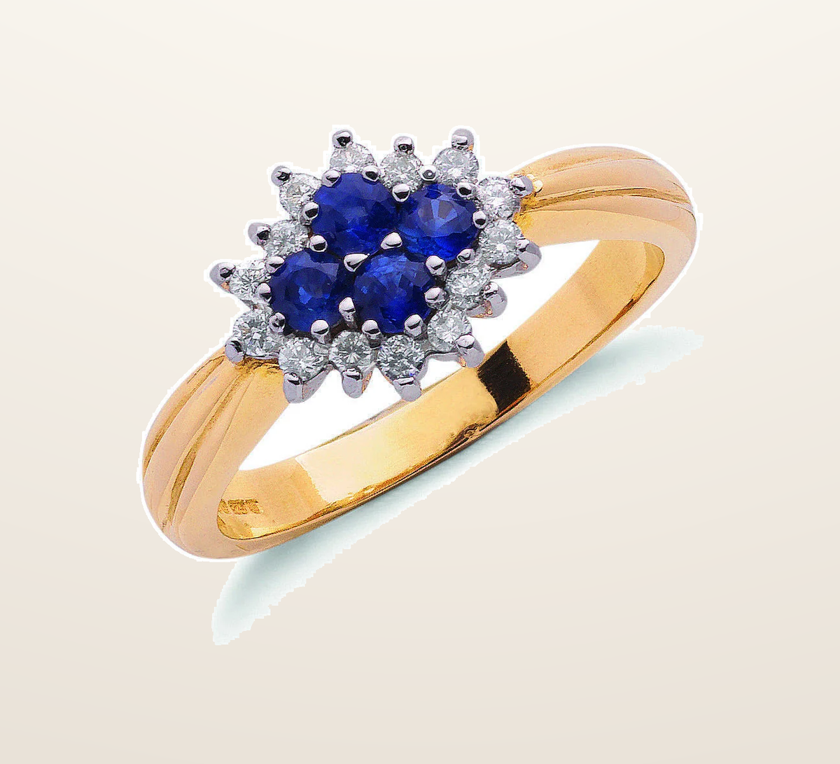 IT_ROLE:presentation_crop | 9ct Yellow Gold 0.21ct Diamond & 0.45ct Sapphire Cluster Ring