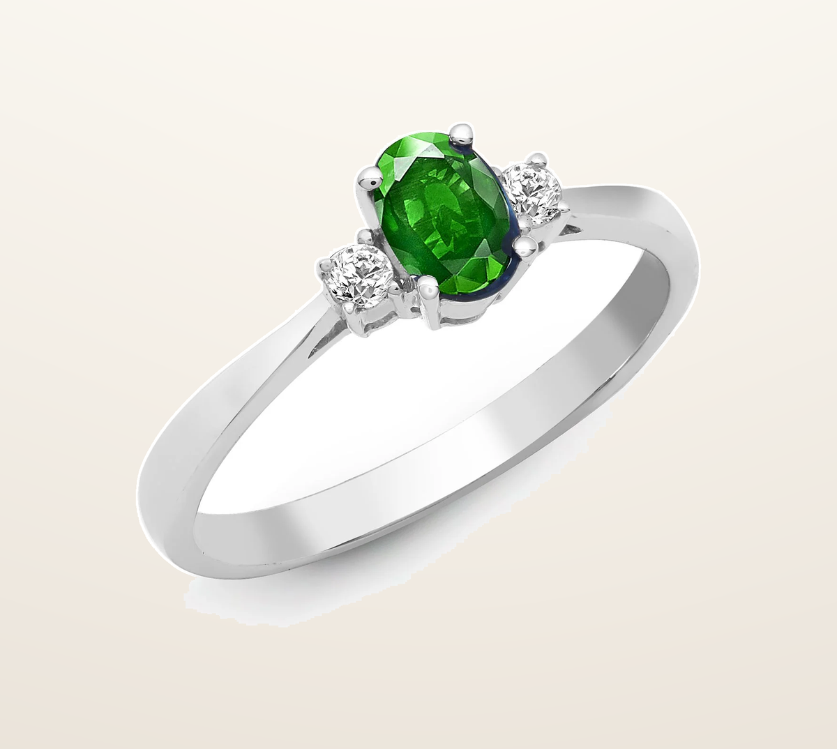 IT_ROLE:presentation_crop | 18ct White Gold Natural Diamond And Emerald And 3 Stone Ring