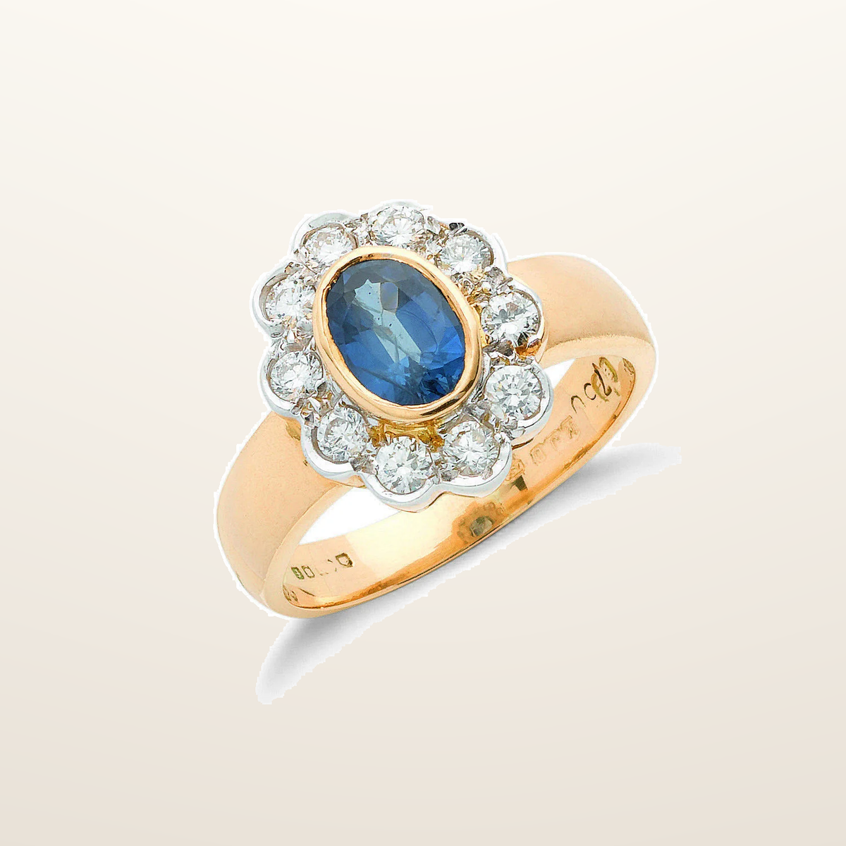 IT_ROLE:studio_clean | 18ct Yellow Gold 0.35ct Diamond & 0.80ct Blue Sapphire Cluster Ring
