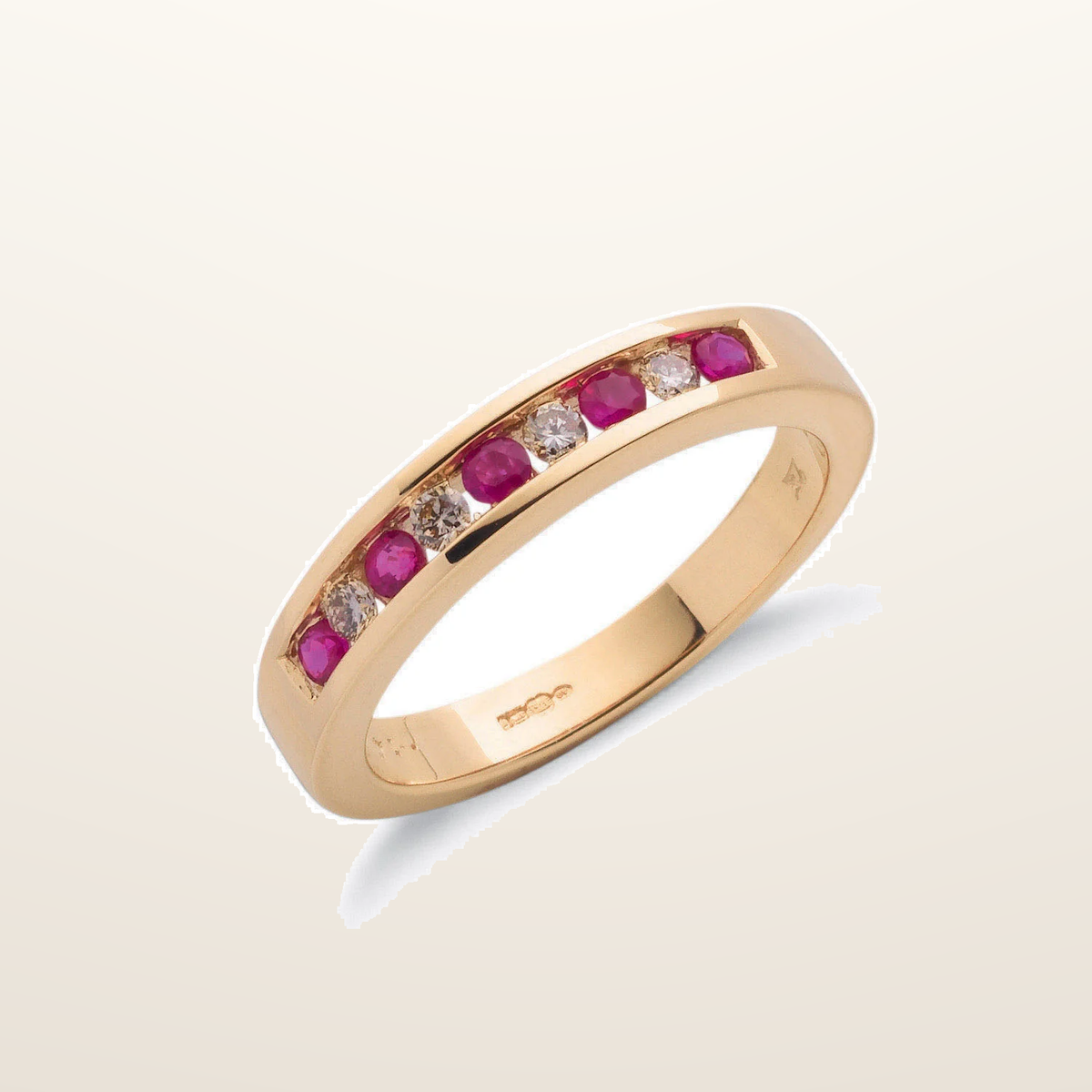 IT_ROLE:studio_clean | 9ct Yellow Gold 0.14ct Diamond & 0.31ct Ruby Eternity Ring