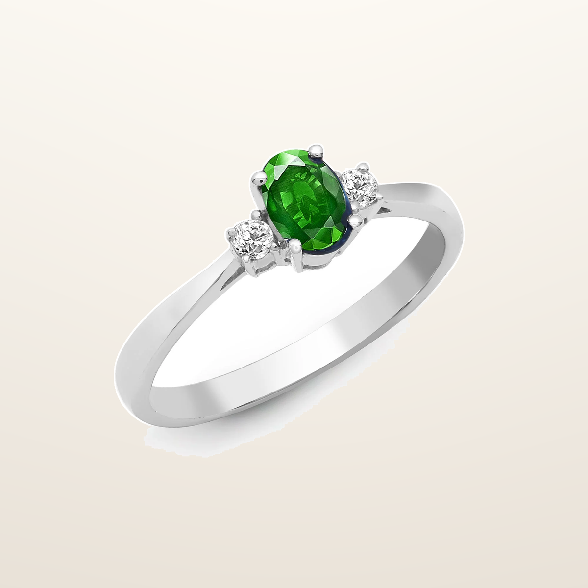 IT_ROLE:studio_clean | 18ct White Gold Natural Diamond And Emerald And 3 Stone Ring