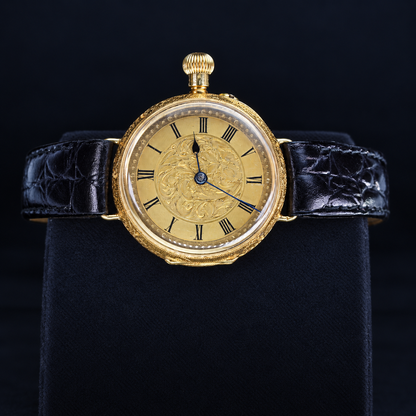 IWC vintage 18K yellow gold engraved Roman numeral dial watch front view