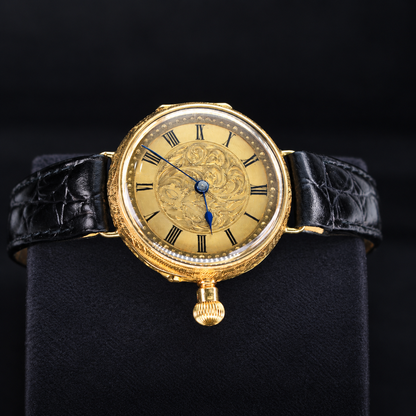 IWC vintage 18K yellow gold engraved dial watch close front view