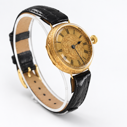 IWC vintage 18K yellow gold engraved case and black leather strap side view