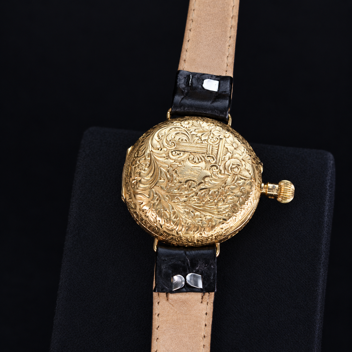IWC vintage 18K yellow gold floral engraved caseback on black leather strap