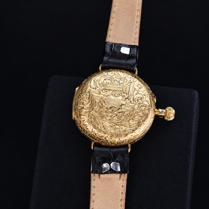 IWC vintage 18K yellow gold floral engraved caseback on black leather strap