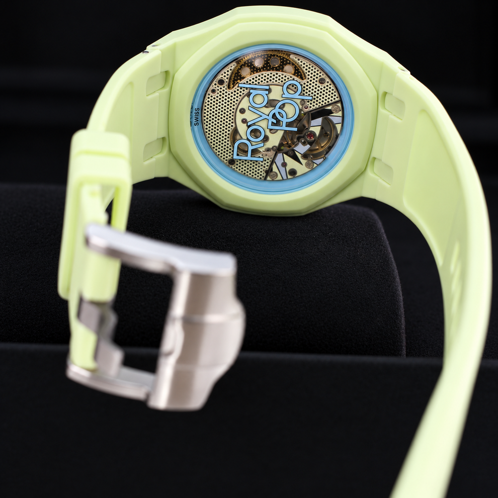 Audemars Piguet x Swatch Royal Pop Blaue Acht transparent caseback showing the movement and Royal Pop lettering
