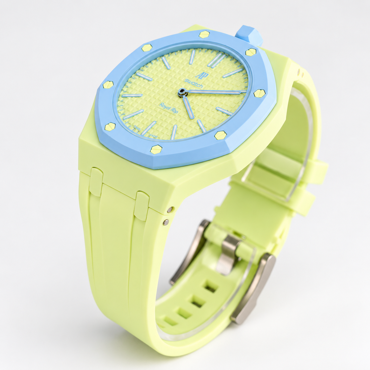 Audemars Piguet x Swatch Royal Pop Blaue Acht angled view showing light-blue bezel, lime strap and silver-tone buckle