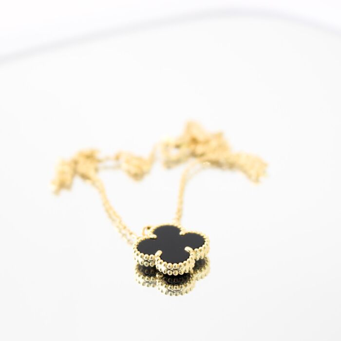 Van cleef onyx alhambra on sale necklace